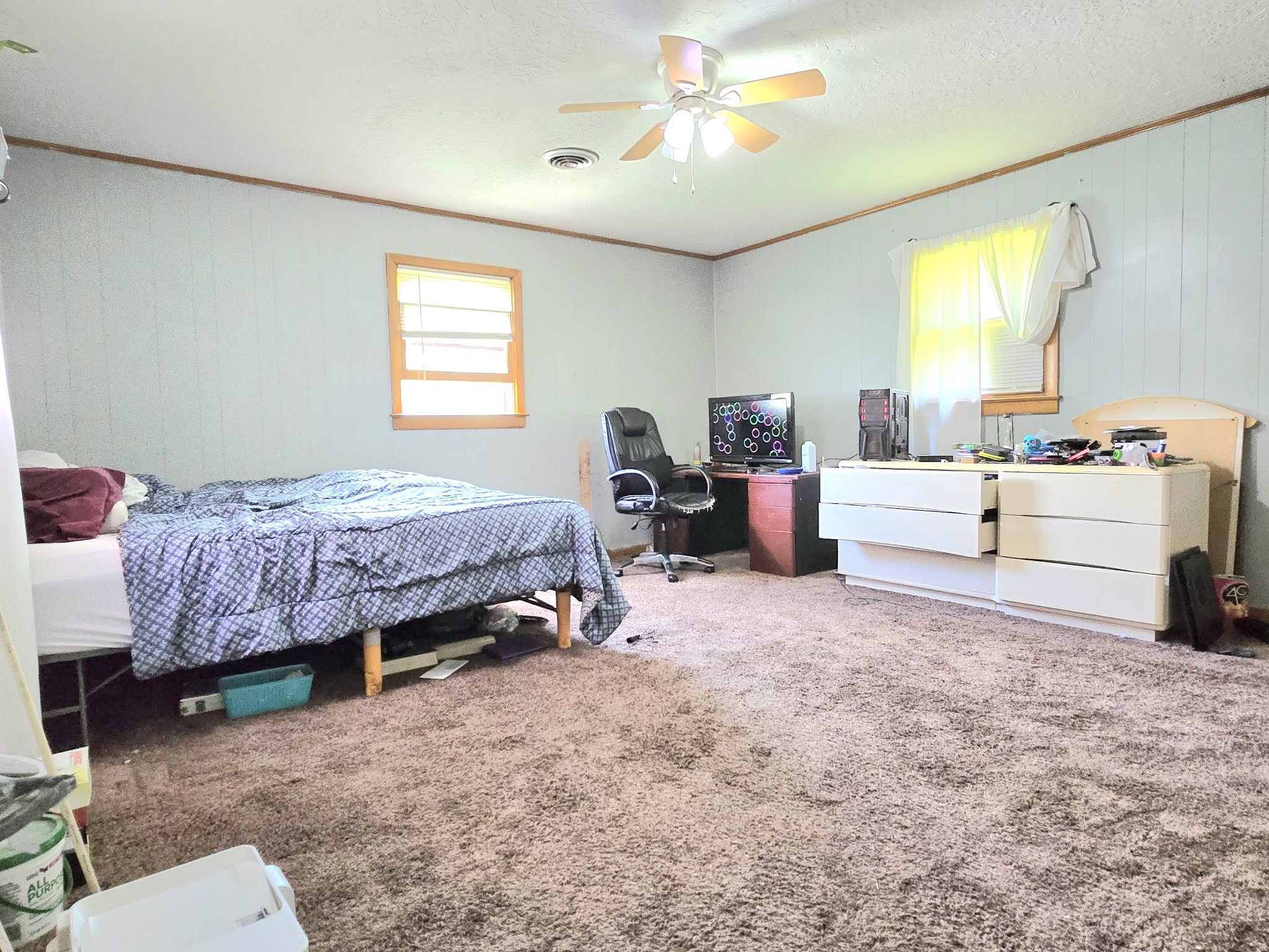 118 Bone Cave Road Rock Island, TN 38581 - Photo 16 of 52 a bed room with a bed and a chair