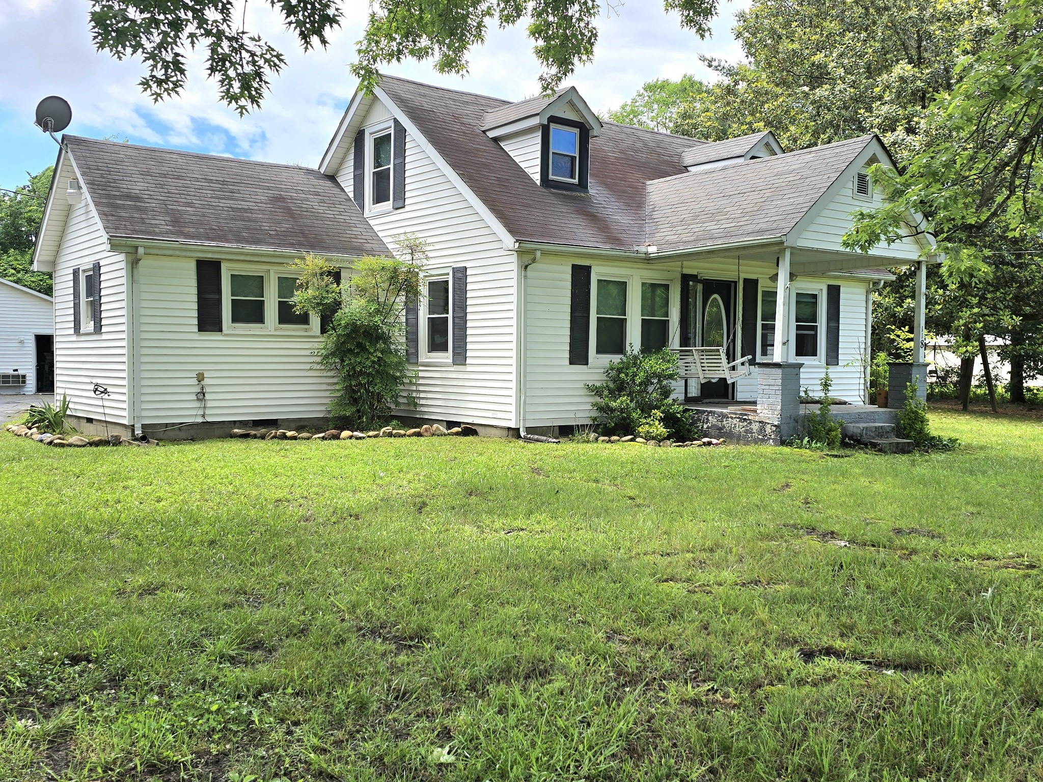 118 Bone Cave Road Rock Island, TN 38581 - Photo 2 of 52 a front view of a house with a yard and porch