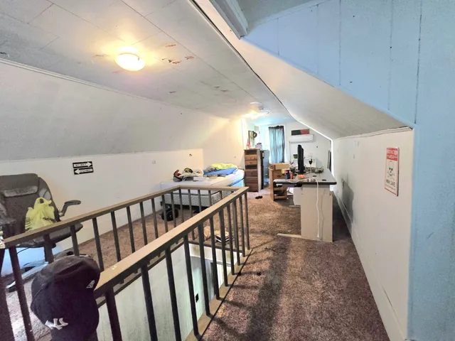 a kitchen with a sink dishwasher stove and refrigerator
