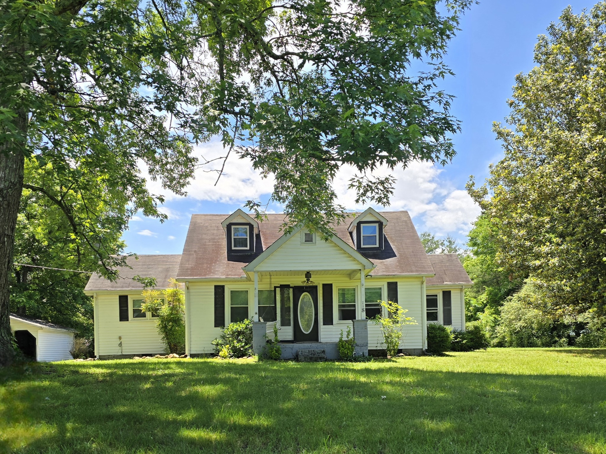 118 Bone Cave Road Rock Island, TN 38581 - Photo 3 of 52 a front view of a house with a yard