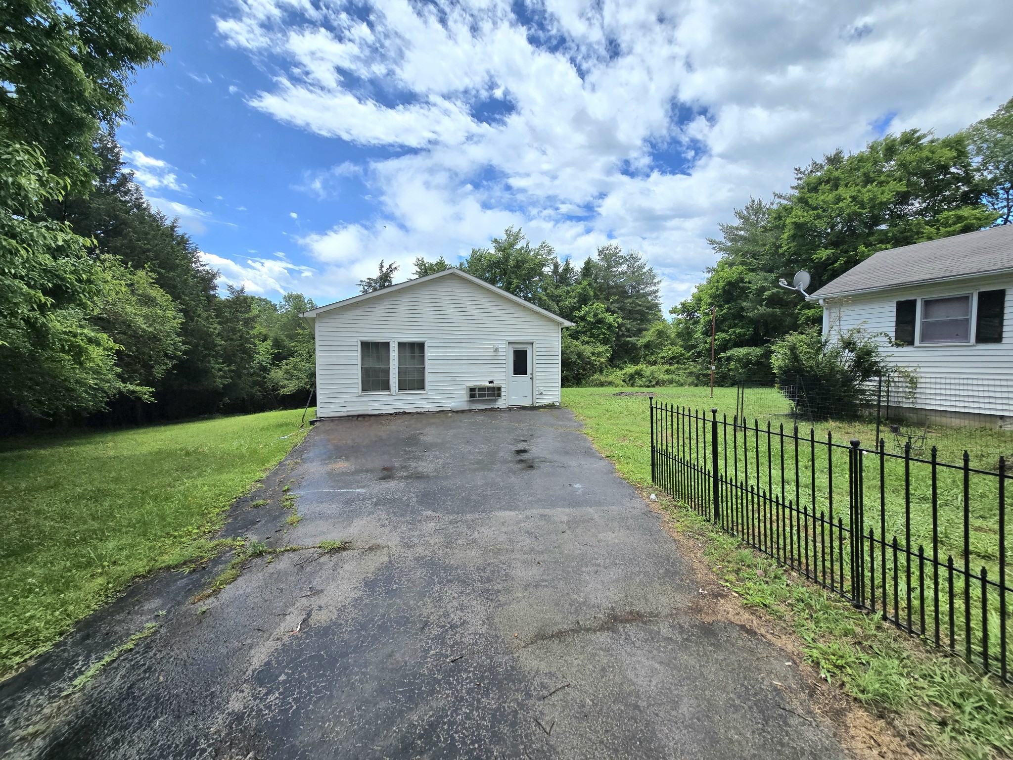 118 Bone Cave Road Rock Island, TN 38581 - Photo 34 of 52 a view of a house with yard and a garden