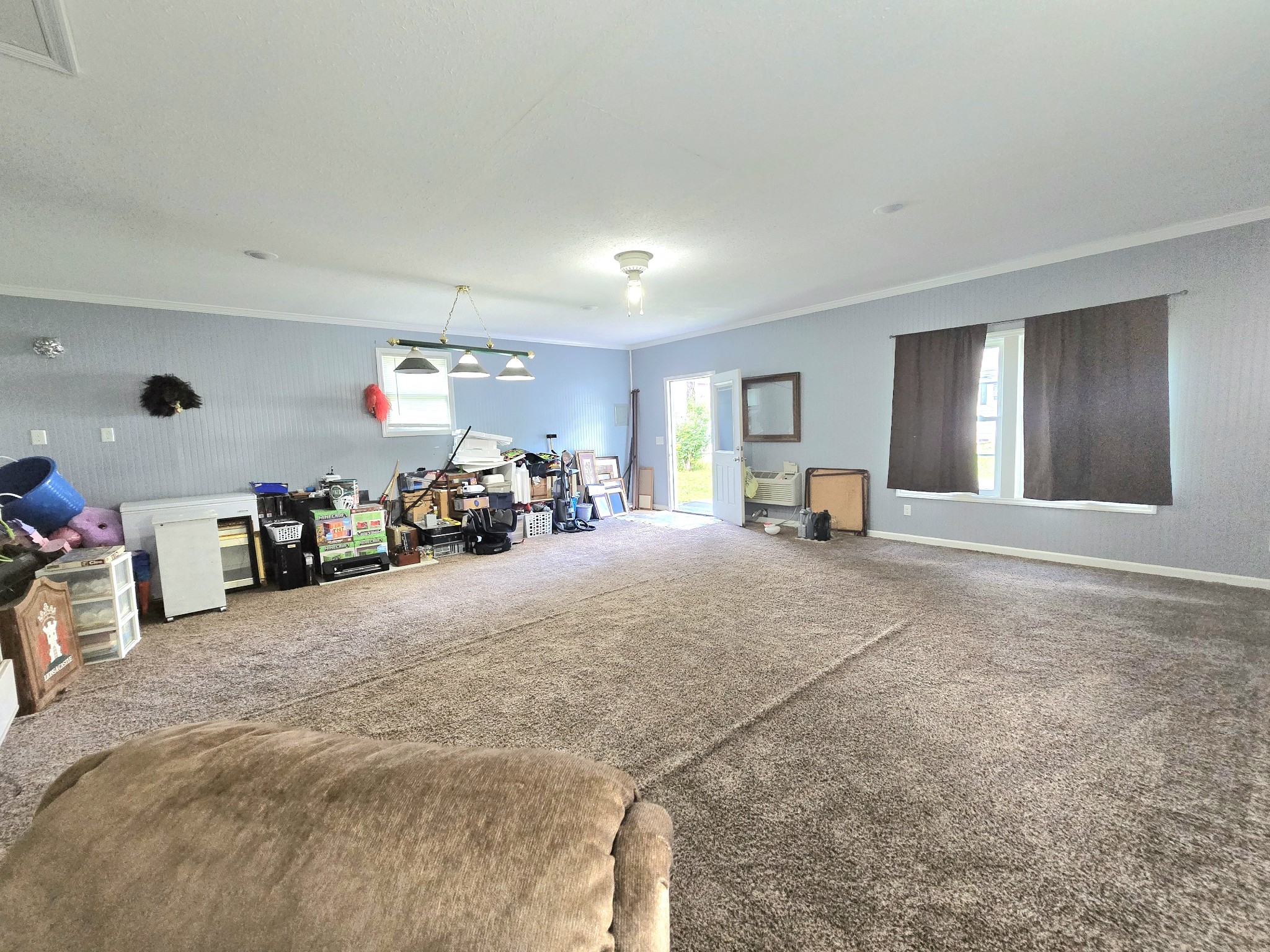 118 Bone Cave Road Rock Island, TN 38581 - Photo 37 of 52 a view of a livingroom with furniture and a garage