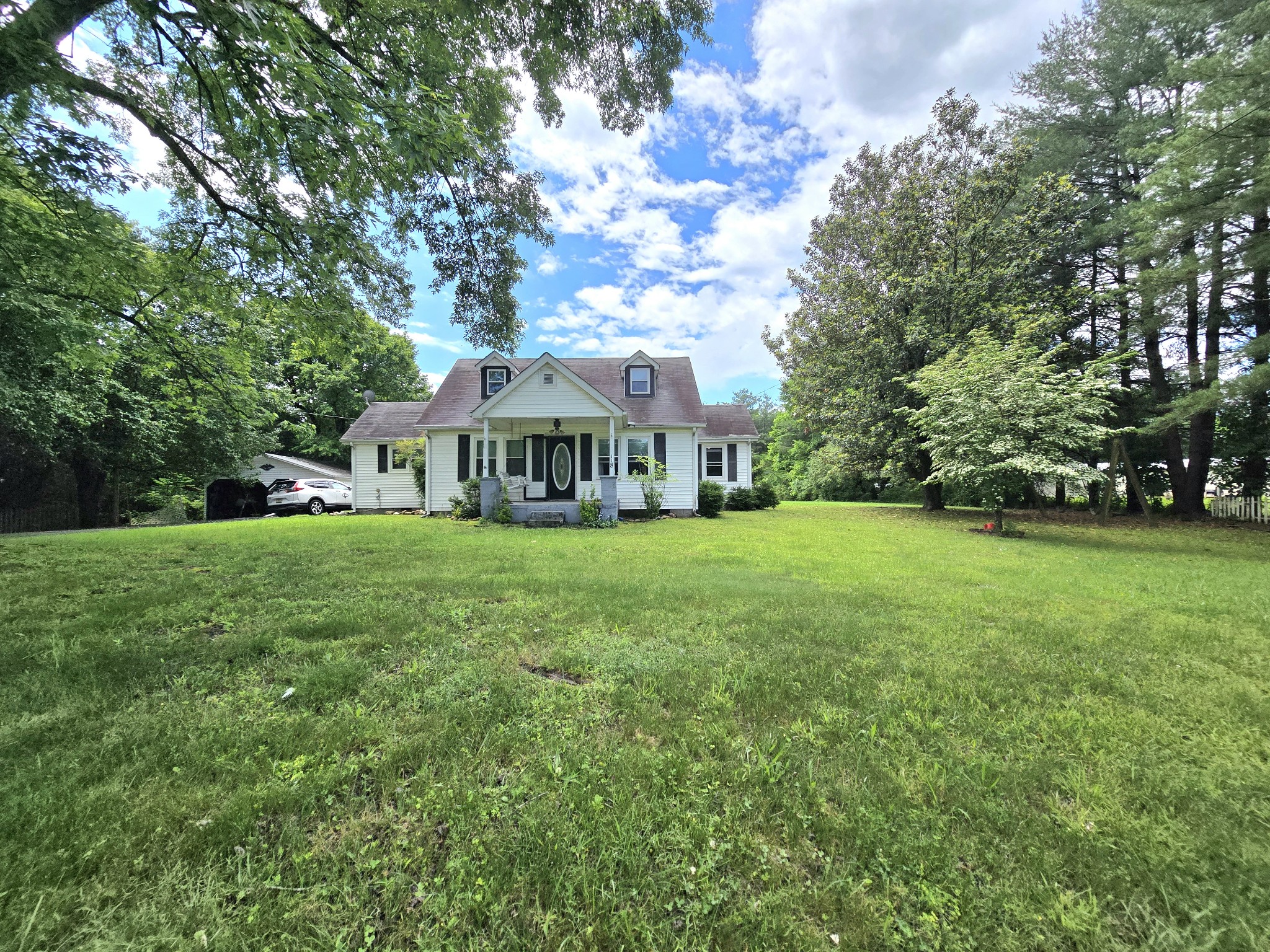 118 Bone Cave Road Rock Island, TN 38581 - Photo 4 of 52 a view of house with garden