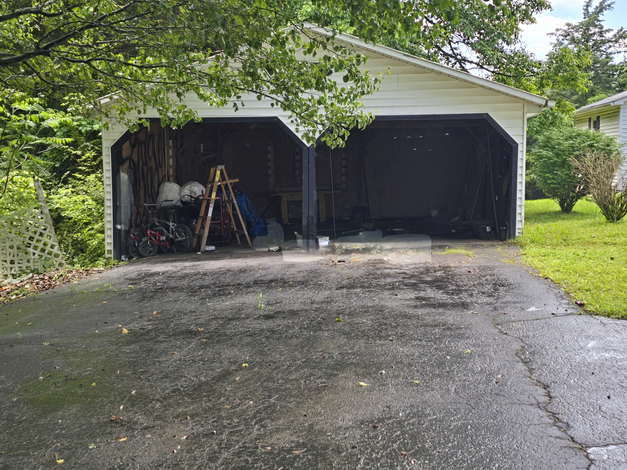 118 Bone Cave Road Rock Island, TN 38581 - Photo 41 of 52 a backyard of a house with table and chairs and a large tree