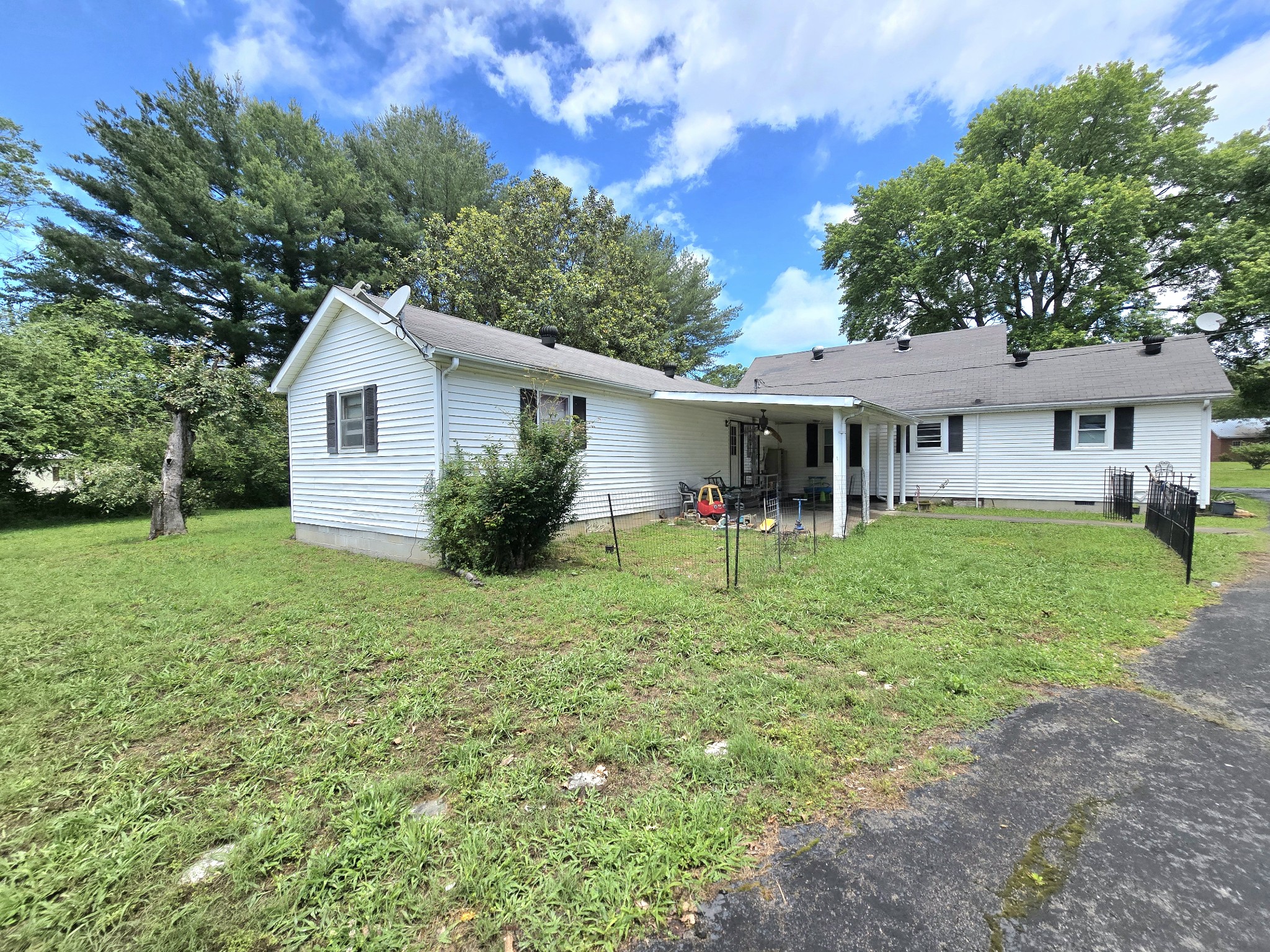 118 Bone Cave Road Rock Island, TN 38581 - Photo 43 of 52 a view of a house with a yard and potted plants