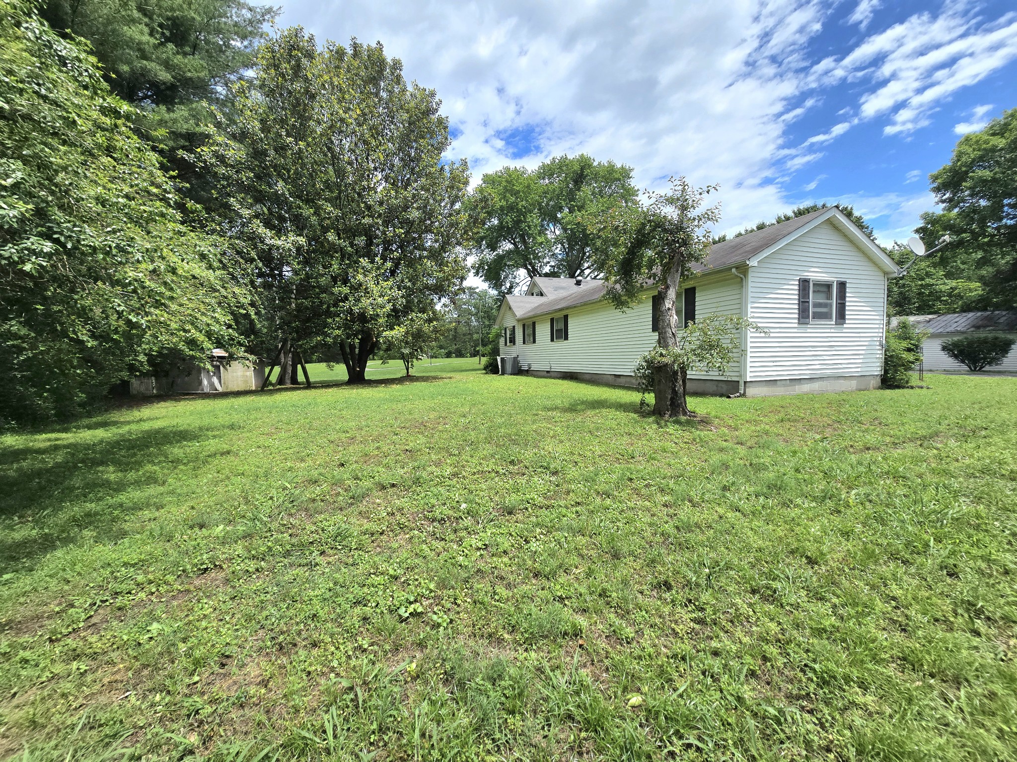 118 Bone Cave Road Rock Island, TN 38581 - Photo 45 of 52 a front view of a house with yard and green space