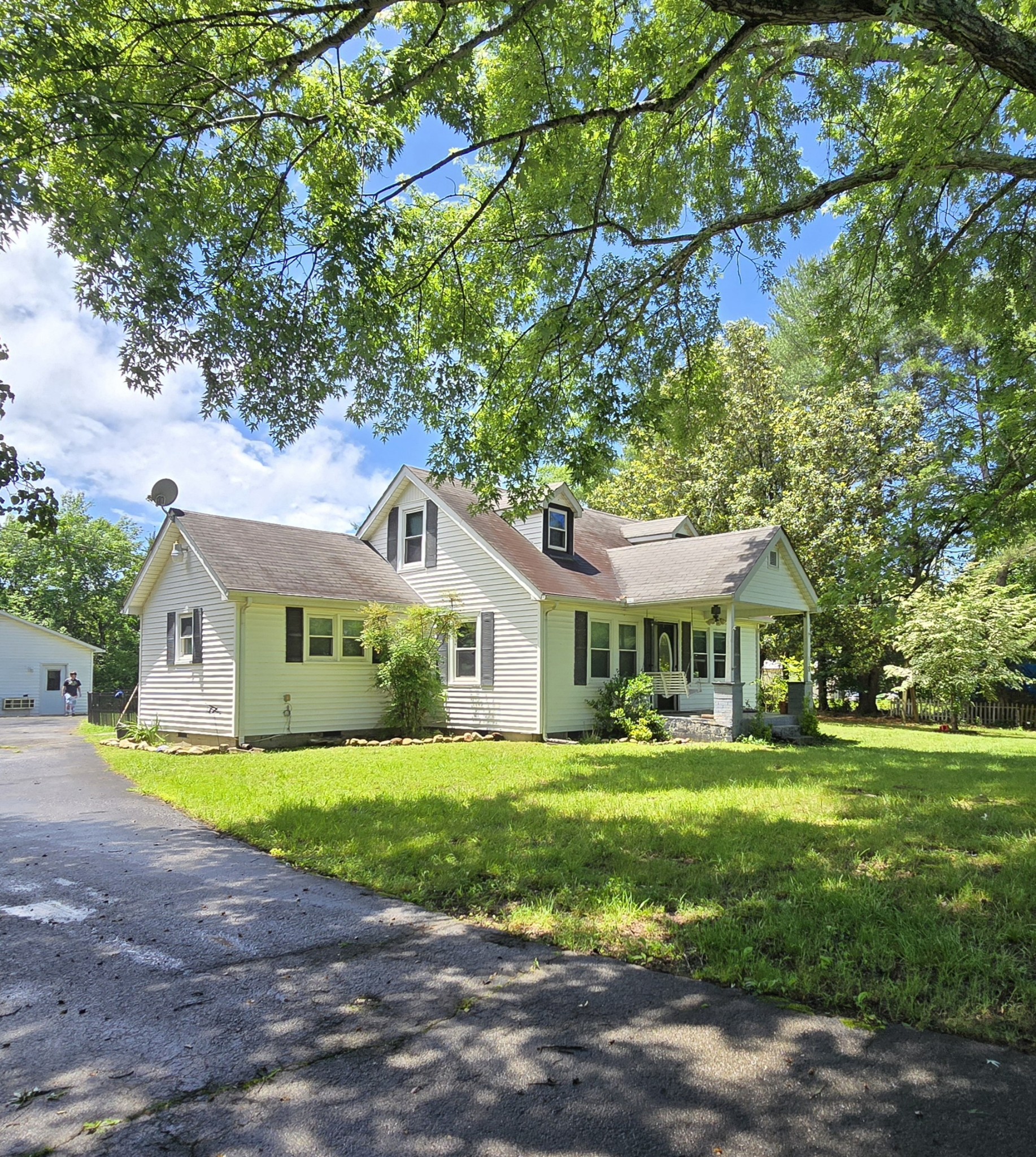 118 Bone Cave Road Rock Island, TN 38581 - Photo 52 of 52 a front view of a house with a yard and trees