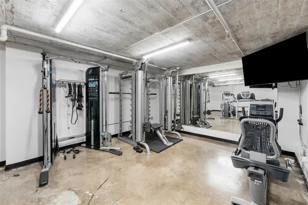 a view of a room with gym equipment