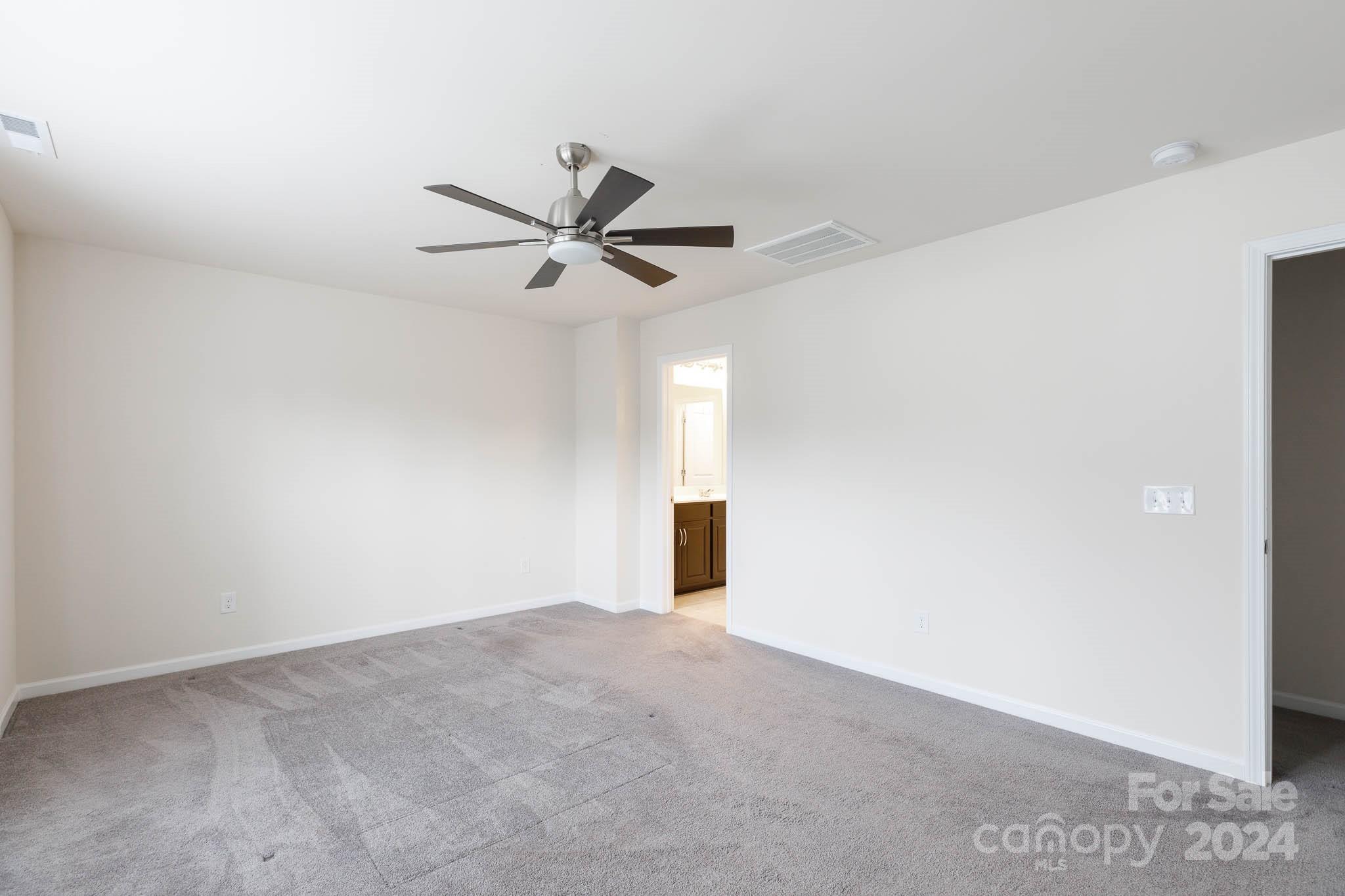 813 Canoe Song Road Fort Mill, SC 29708 - Photo 12 of 26 a view of a big room with carpet
