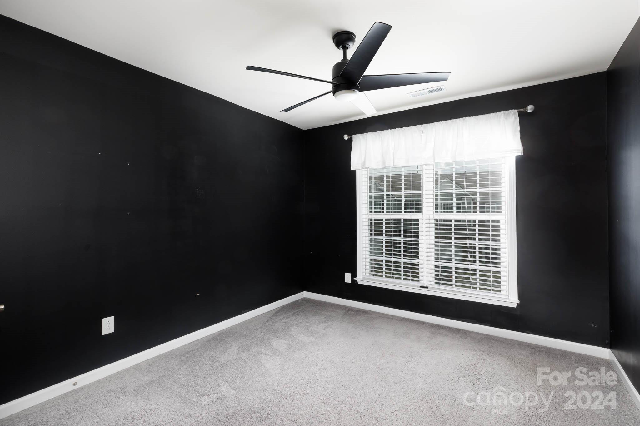 813 Canoe Song Road Fort Mill, SC 29708 - Photo 19 of 26 a view of an empty room with a window