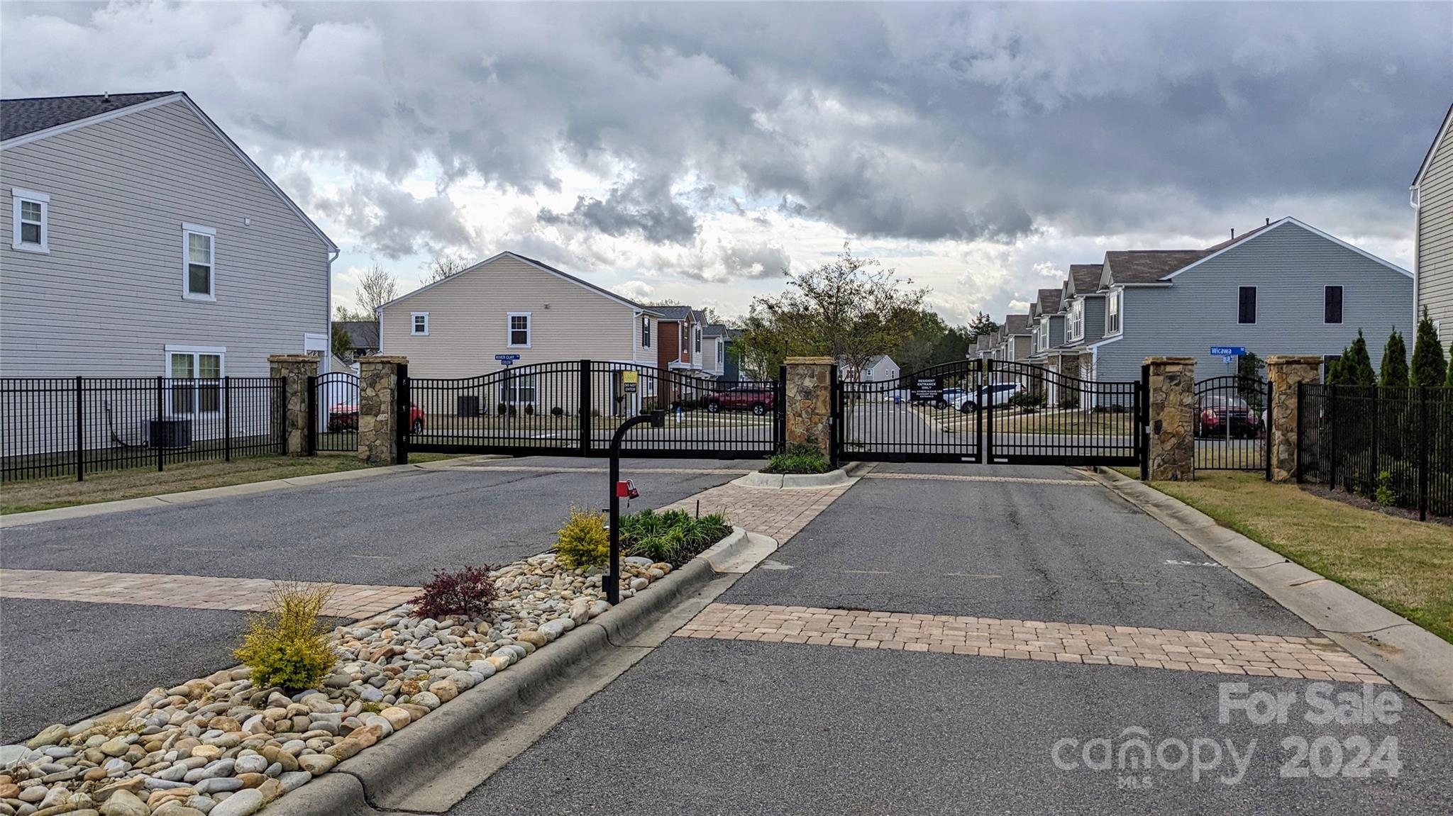 813 Canoe Song Road Fort Mill, SC 29708 - Photo 24 of 26 a view of a street with houses