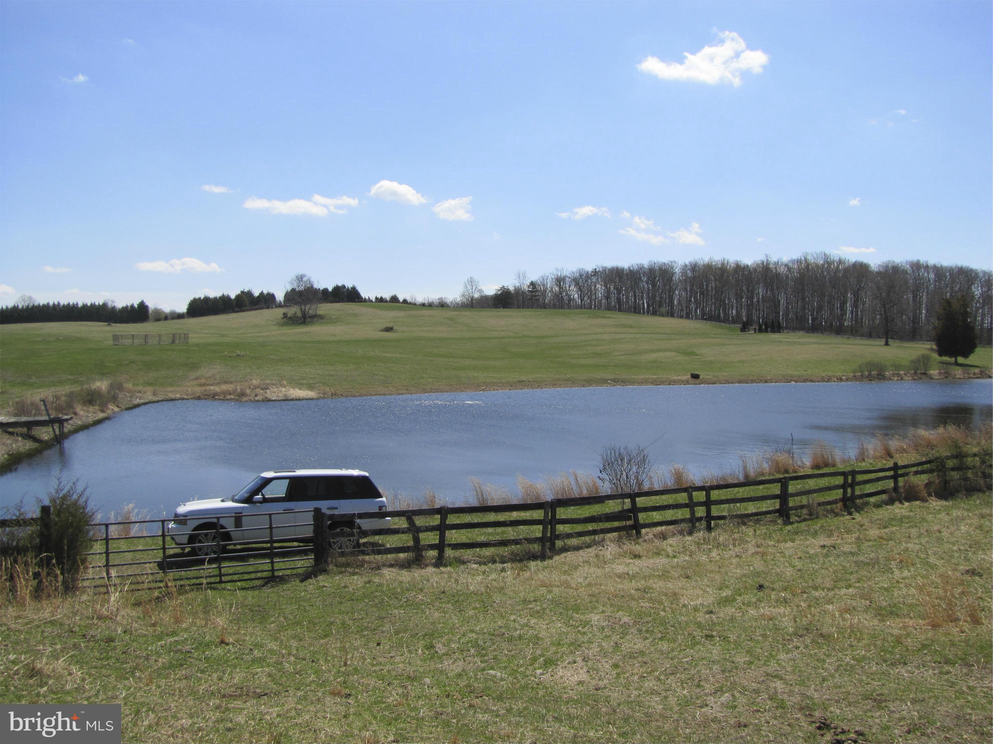 10410 Conde Road Marshall, VA 20115 - Photo 9 of 13 Pond with vehicle