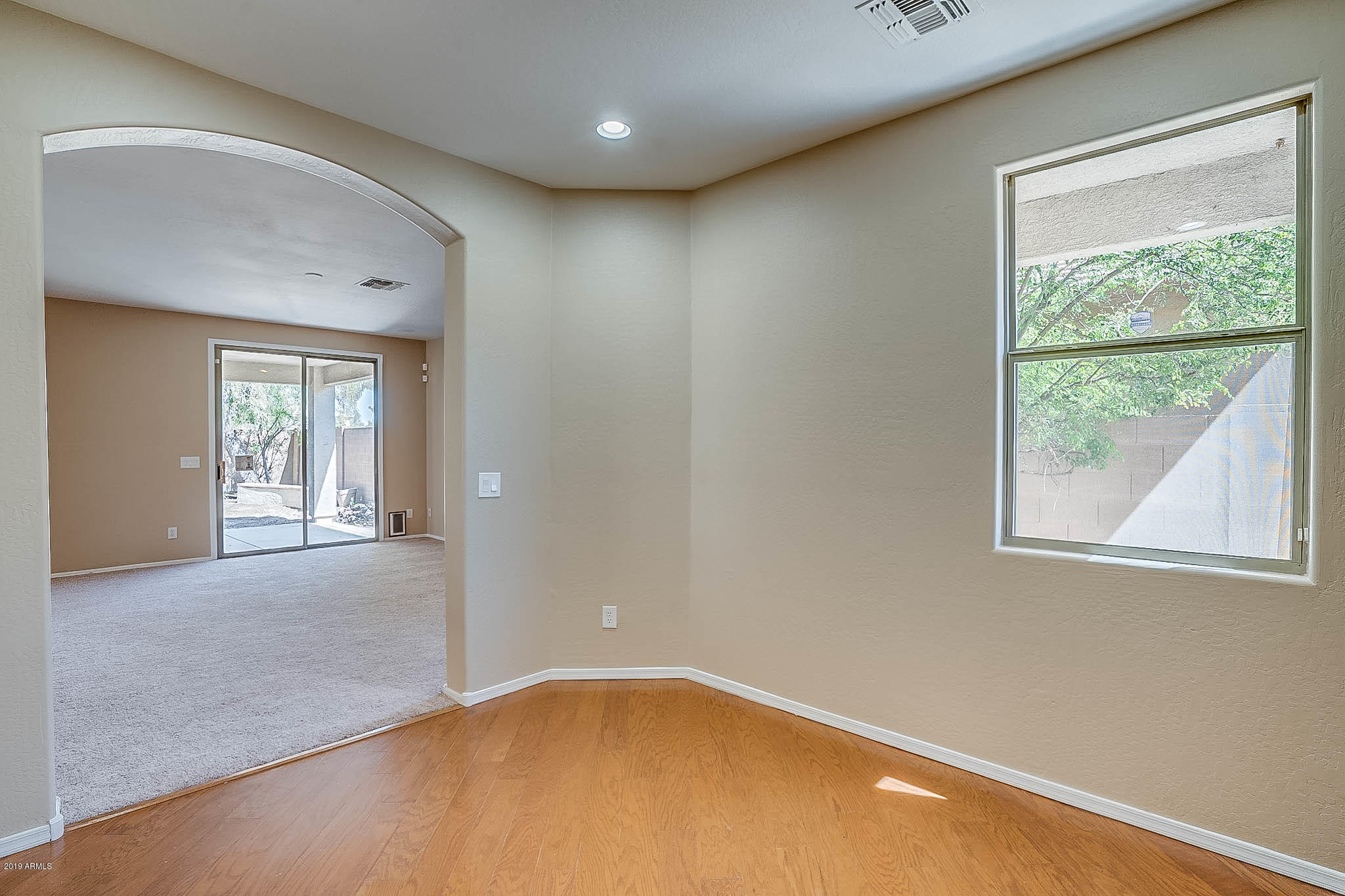 8754 West Payson Road Tolleson, AZ 85353 - Photo 11 of 19 an empty room with windows