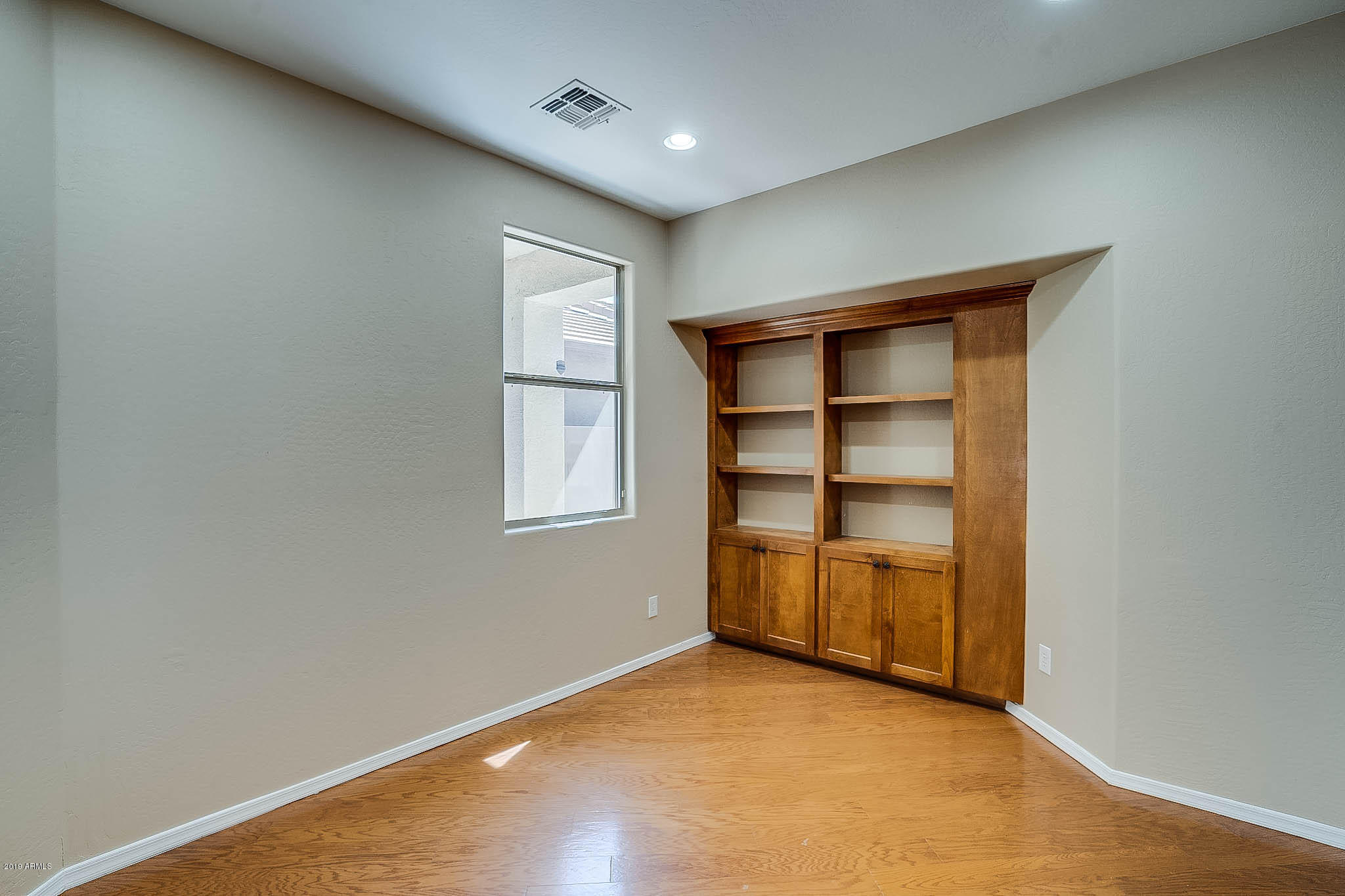 8754 West Payson Road Tolleson, AZ 85353 - Photo 10 of 19 an empty room with windows