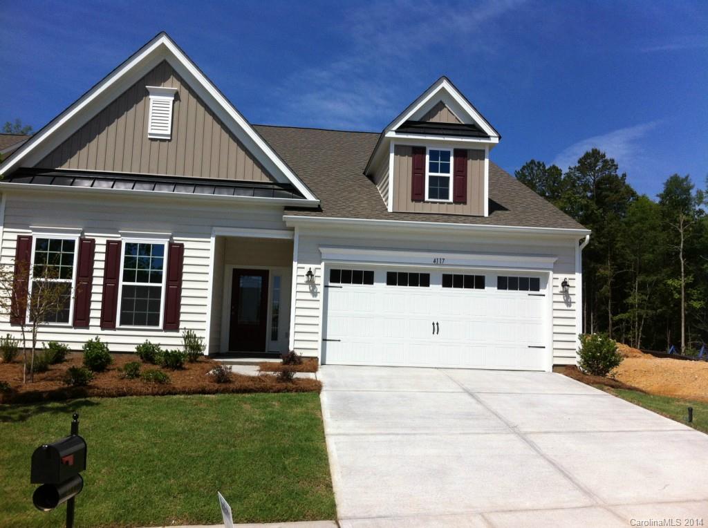 4117 Perth Road, Unit 374 Indian Land, SC 29707 - Photo 1 of 13 a front view of a house with a yard and garage