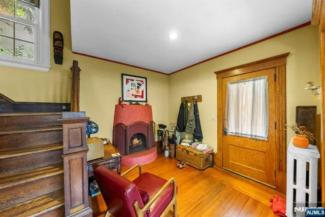 a bedroom with bed and a window