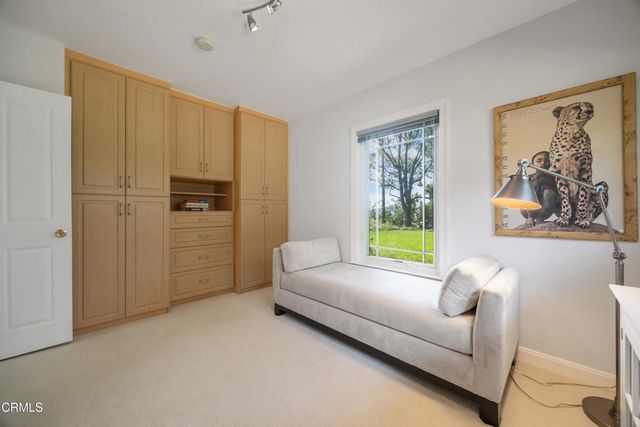 a swimming pool with wooden fence