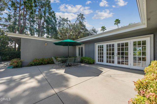 an aerial view of residential house and green space