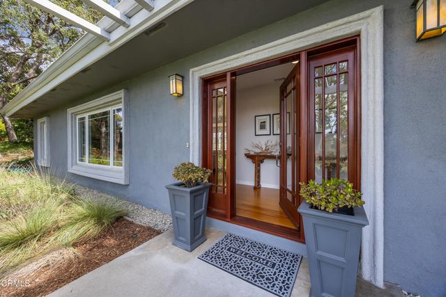 a view of a livingroom with furniture and window