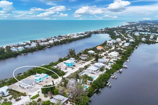 an aerial view of lake residential house with outdoor space