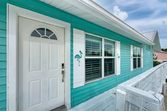 a front view of a house with yard