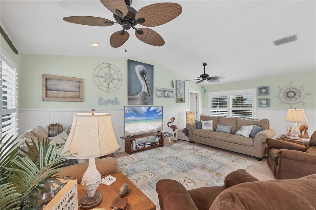 261 Bocilla Drive Placida, FL 33946 - Photo 10 of 43 a living room with furniture and a large window