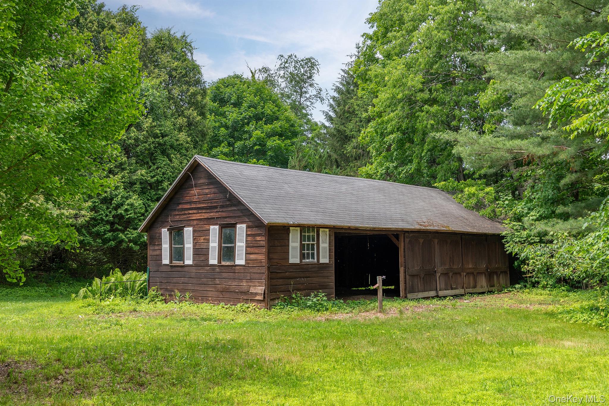 202 Buckwheat Road Hudson, NY 12534 - Photo 40 of 49 a view of a house with a yard