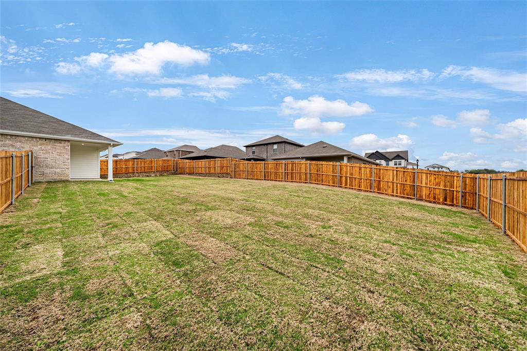 417 Martell Road Lowry Crossing, TX 75069 - Photo 2 of 29 a view of a yard with an umbrella