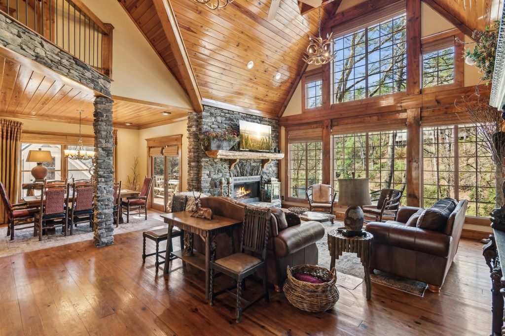 124 River Shoals Road Ellijay, GA 30536 - Photo 10 of 57 a dining room with furniture water view and large windows