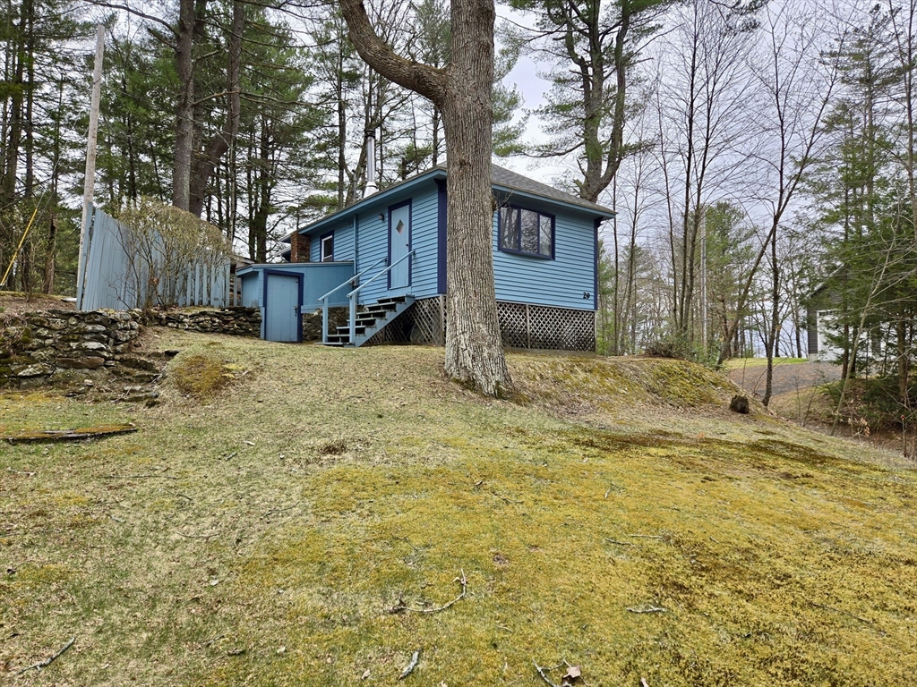 29 Finn Park Road Rutland, MA 01543 - Photo 23 of 24 a view of a house with snow on the background