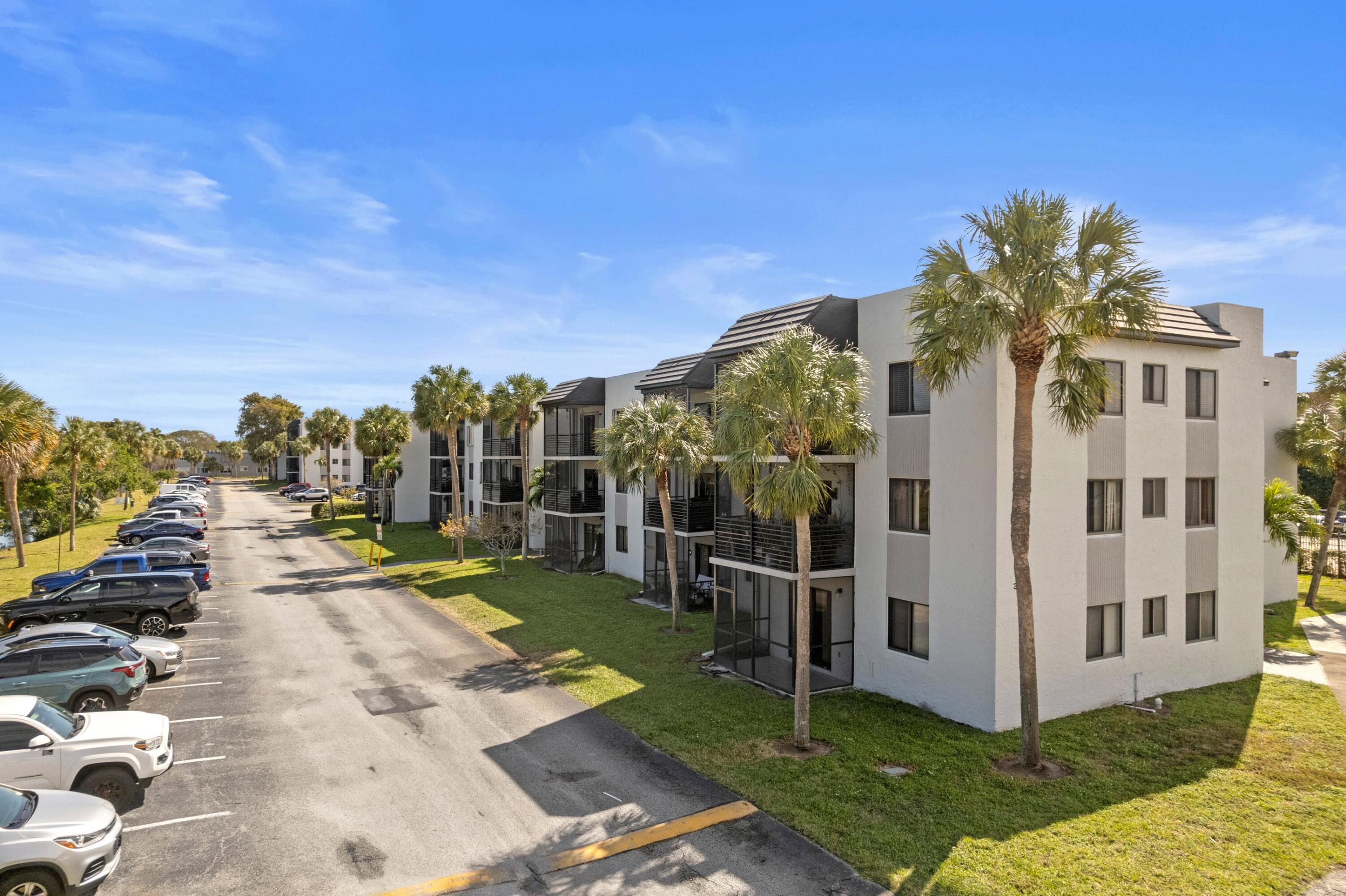 3710 North Pine Island Road, Unit 114 Sunrise, FL 33351 - Photo 21 of 32 a view of a city with tall buildings and a big yard