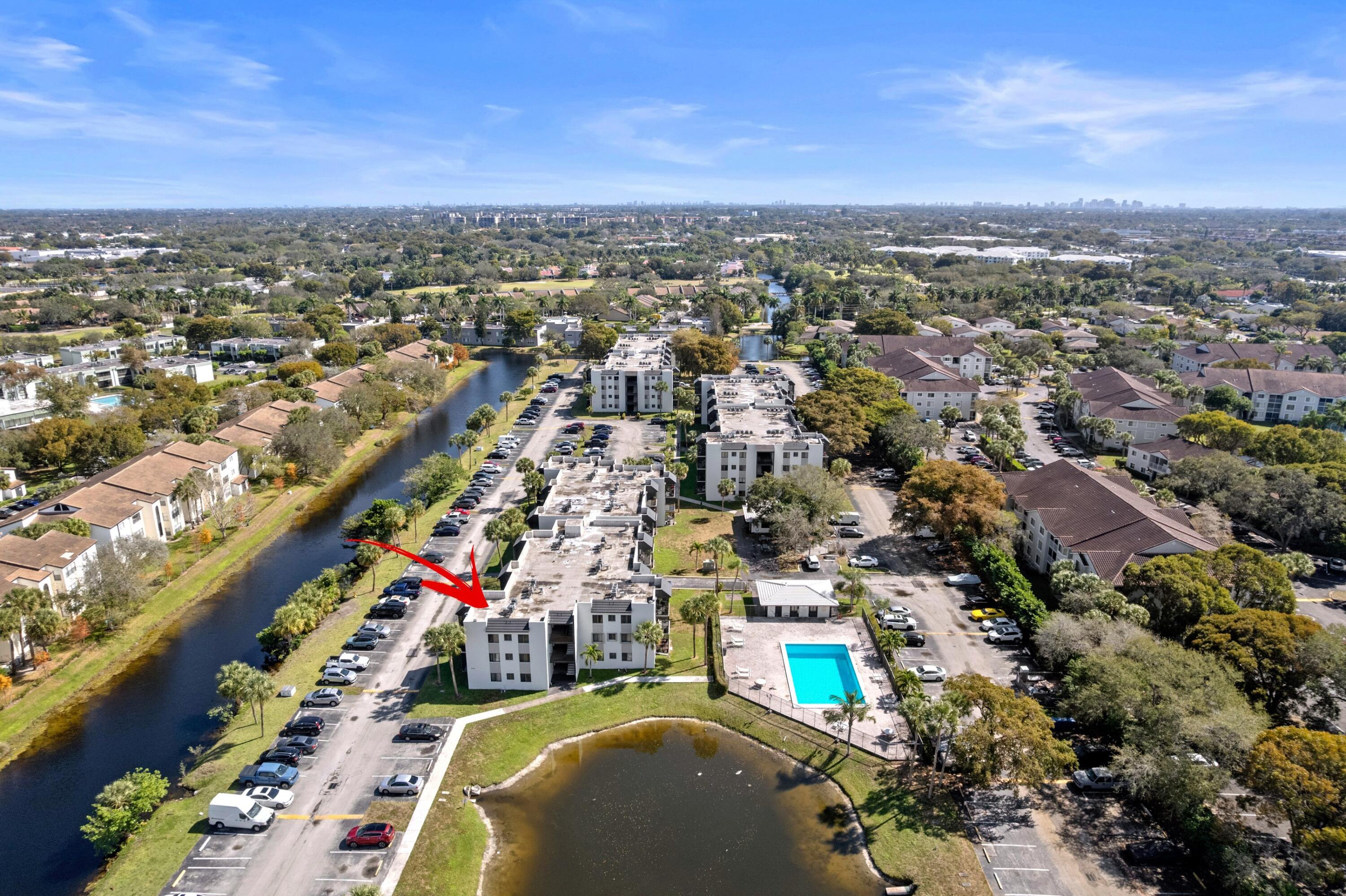 3710 North Pine Island Road, Unit 114 Sunrise, FL 33351 - Photo 24 of 32 an aerial view of city