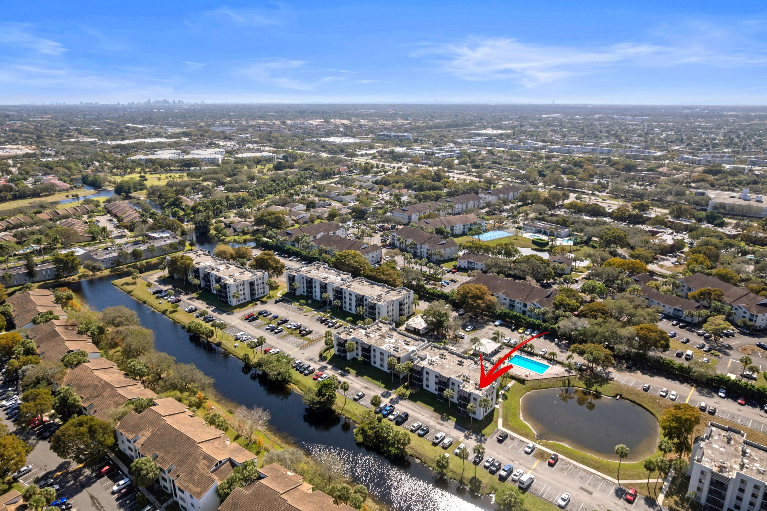 3710 North Pine Island Road, Unit 114 Sunrise, FL 33351 - Photo 25 of 32 an aerial view of city and lake