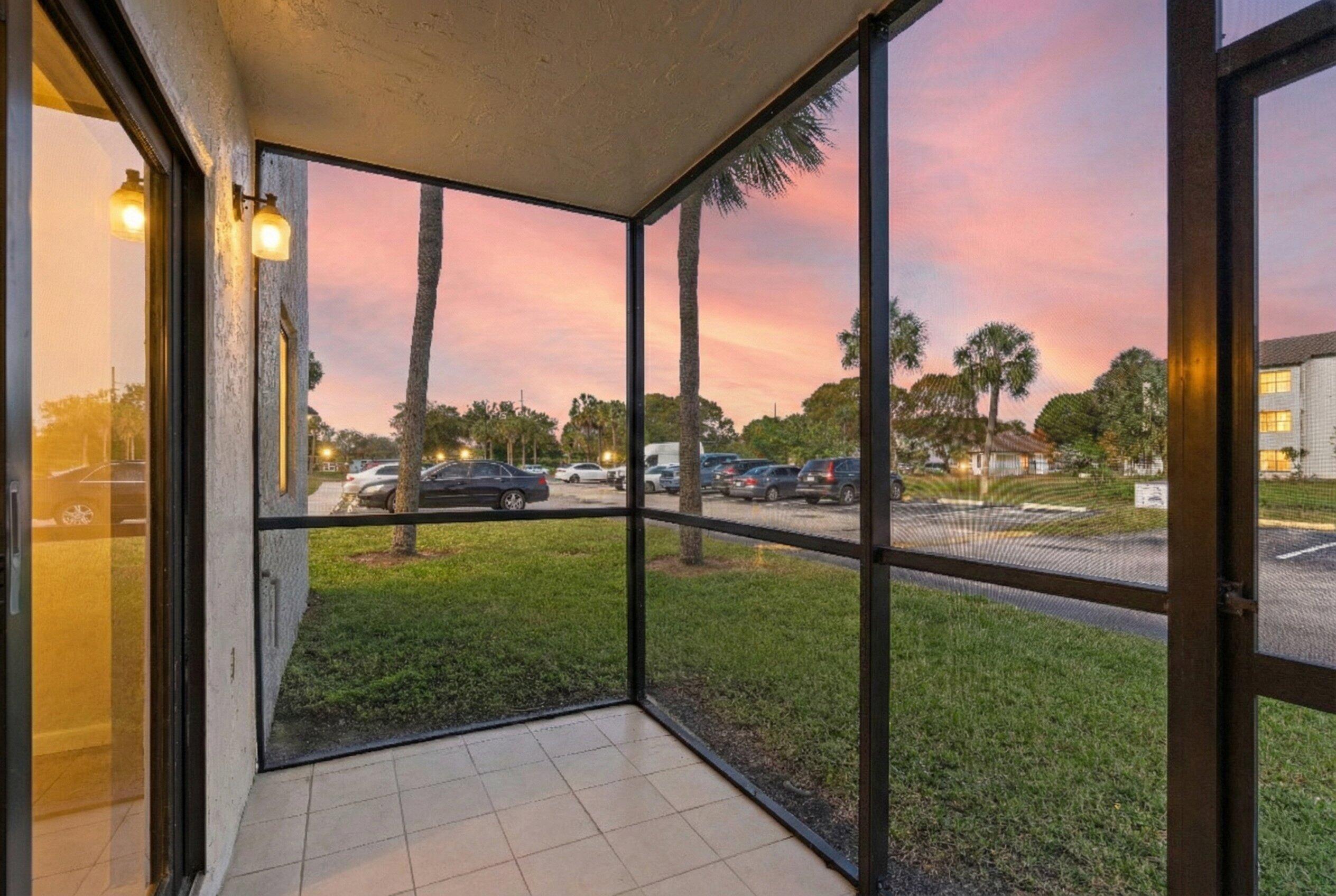 3710 North Pine Island Road, Unit 114 Sunrise, FL 33351 - Photo 3 of 32 a view of a garden from a window