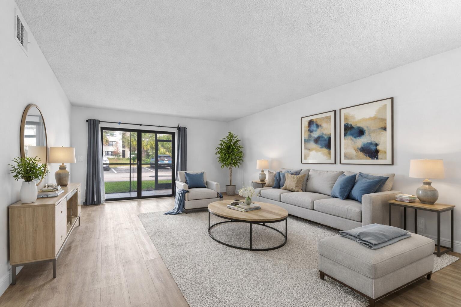 3710 North Pine Island Road, Unit 114 Sunrise, FL 33351 - Photo 5 of 32 a living room with furniture and a large window with outer view