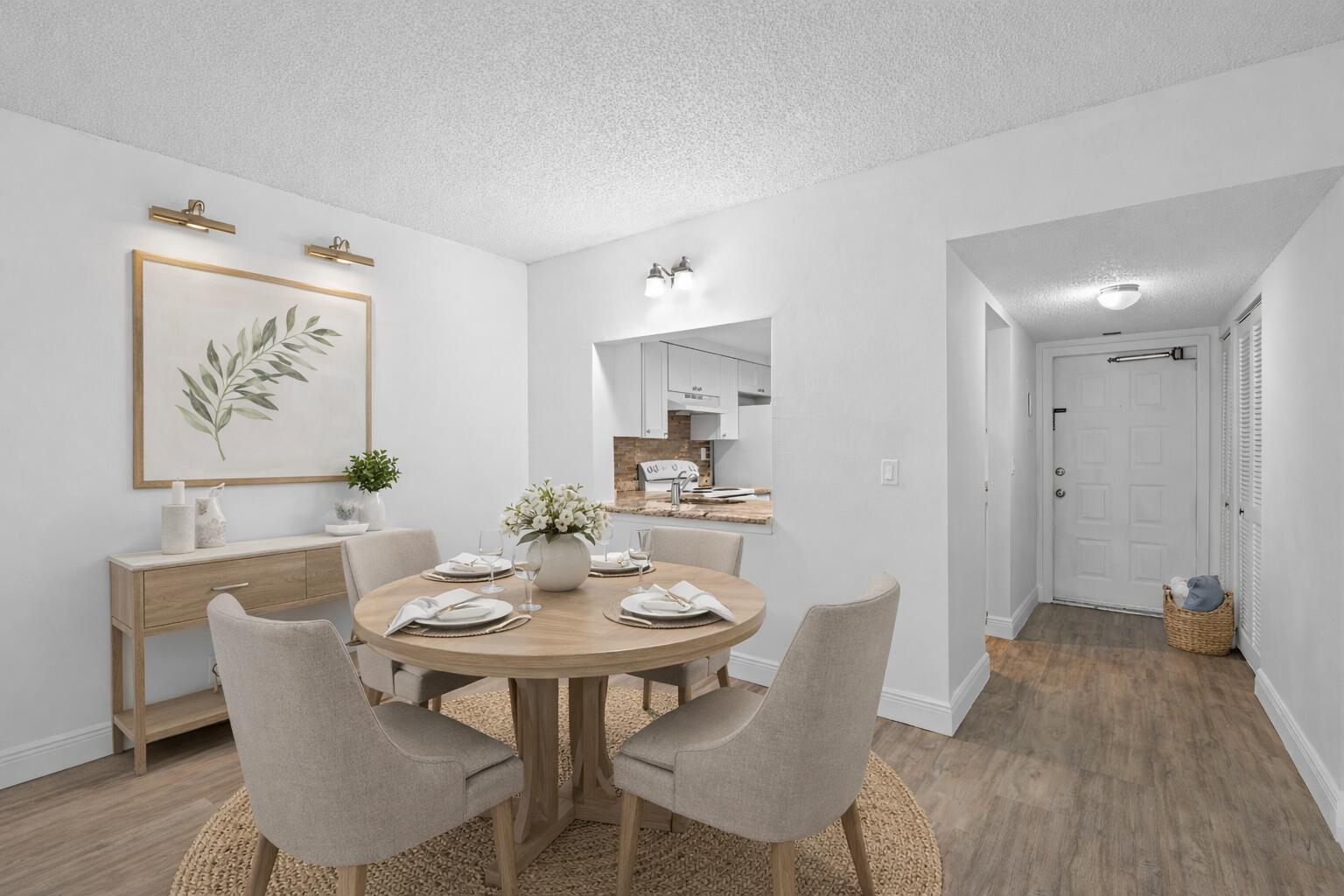 3710 North Pine Island Road, Unit 114 Sunrise, FL 33351 - Photo 6 of 32 a view of a dining room with furniture and wooden floor