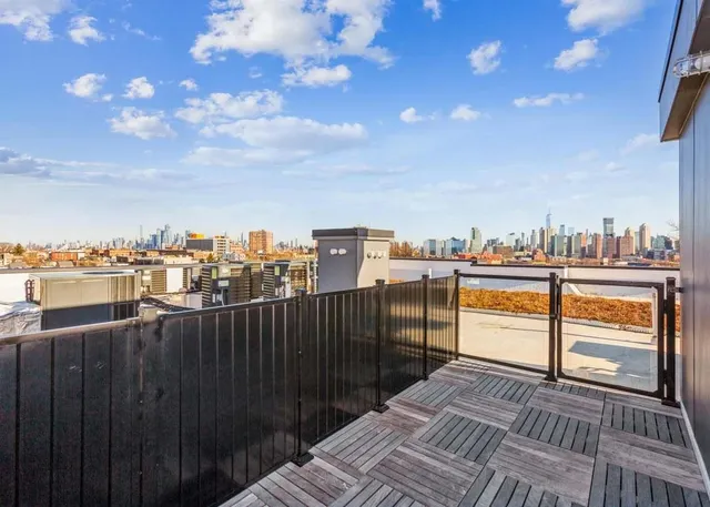 a view of a terrace with city view
