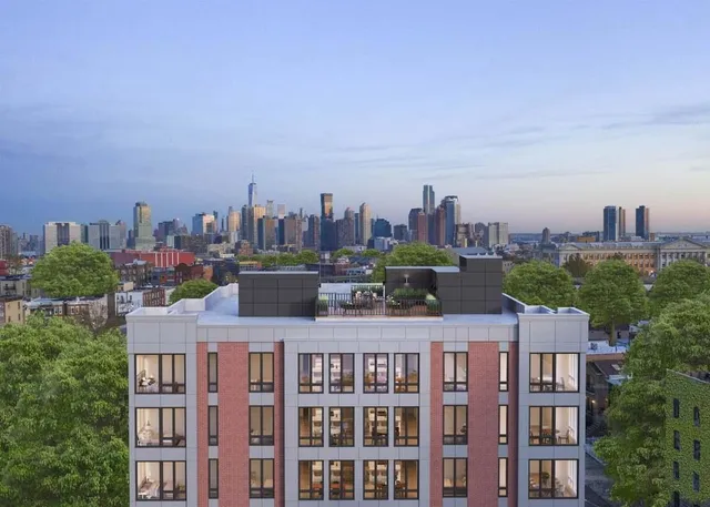 a view of city with tall buildings