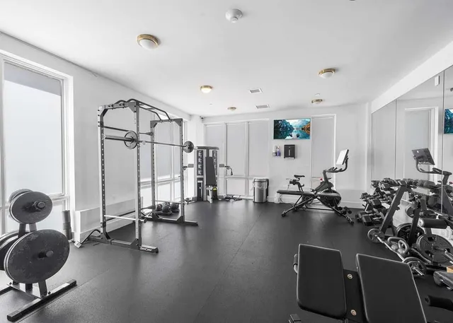 a view of a room with gym equipment