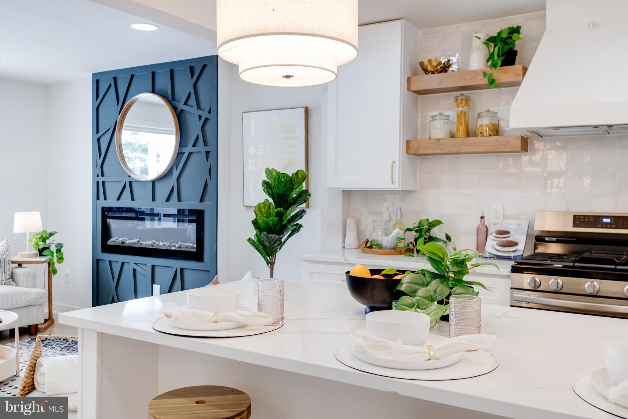 7606 Bagley Avenue Baltimore, MD 21234 - Photo 11 of 45 a kitchen with a table and chairs