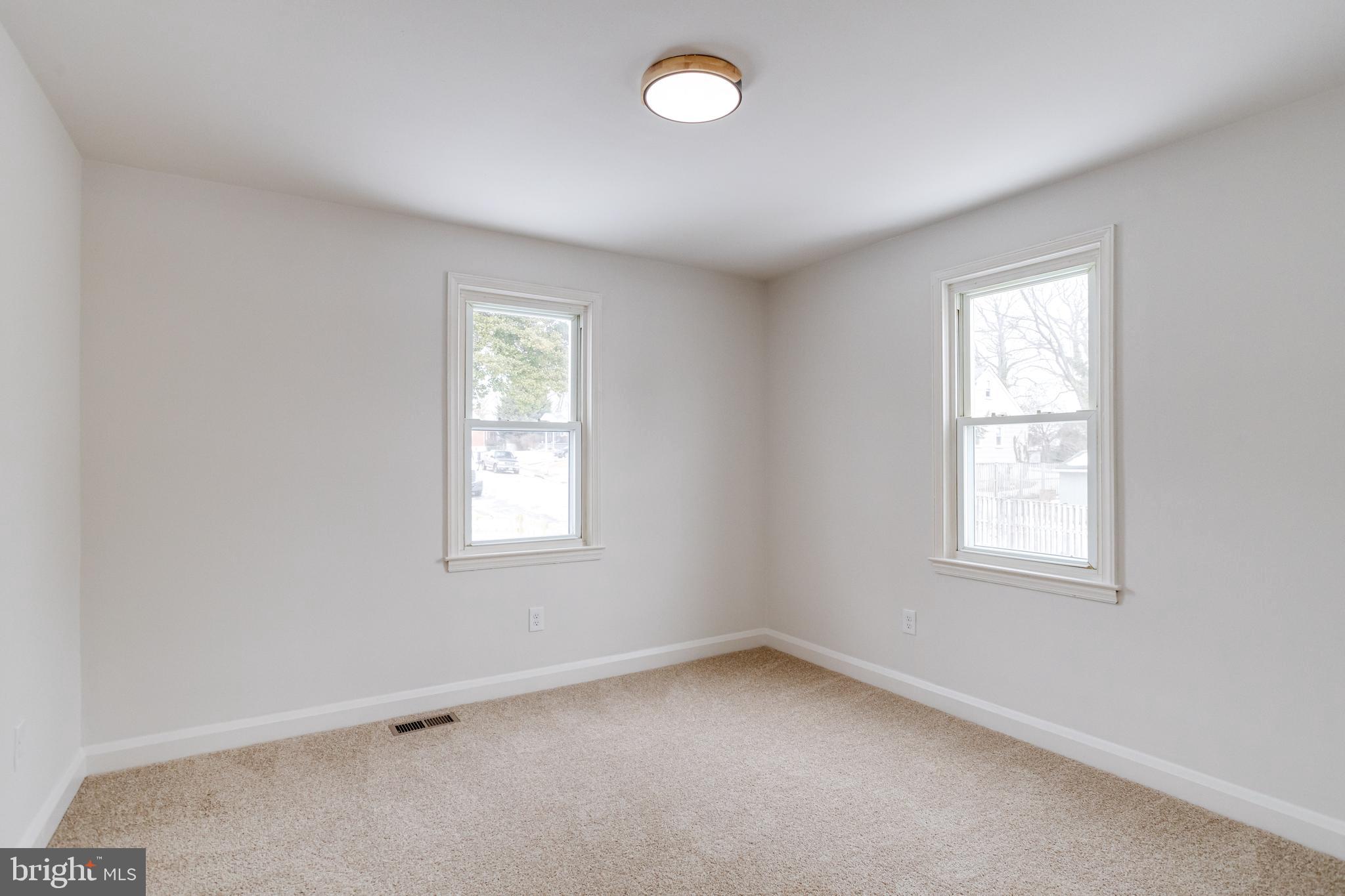 7606 Bagley Avenue Baltimore, MD 21234 - Photo 19 of 45 an empty room with a window