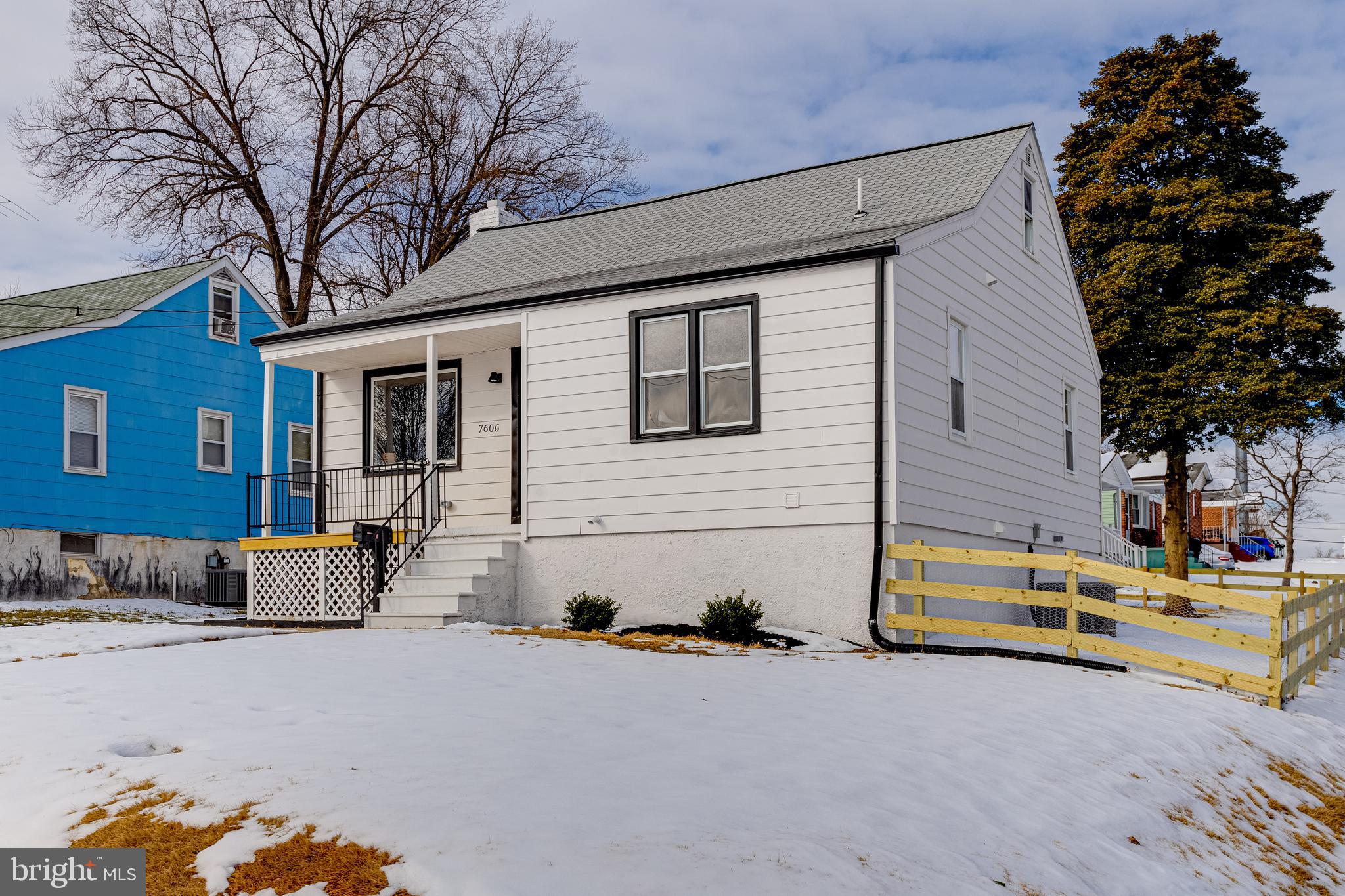 7606 Bagley Avenue Baltimore, MD 21234 - Photo 2 of 45 a backyard of a house with barbeque oven and outdoor seating