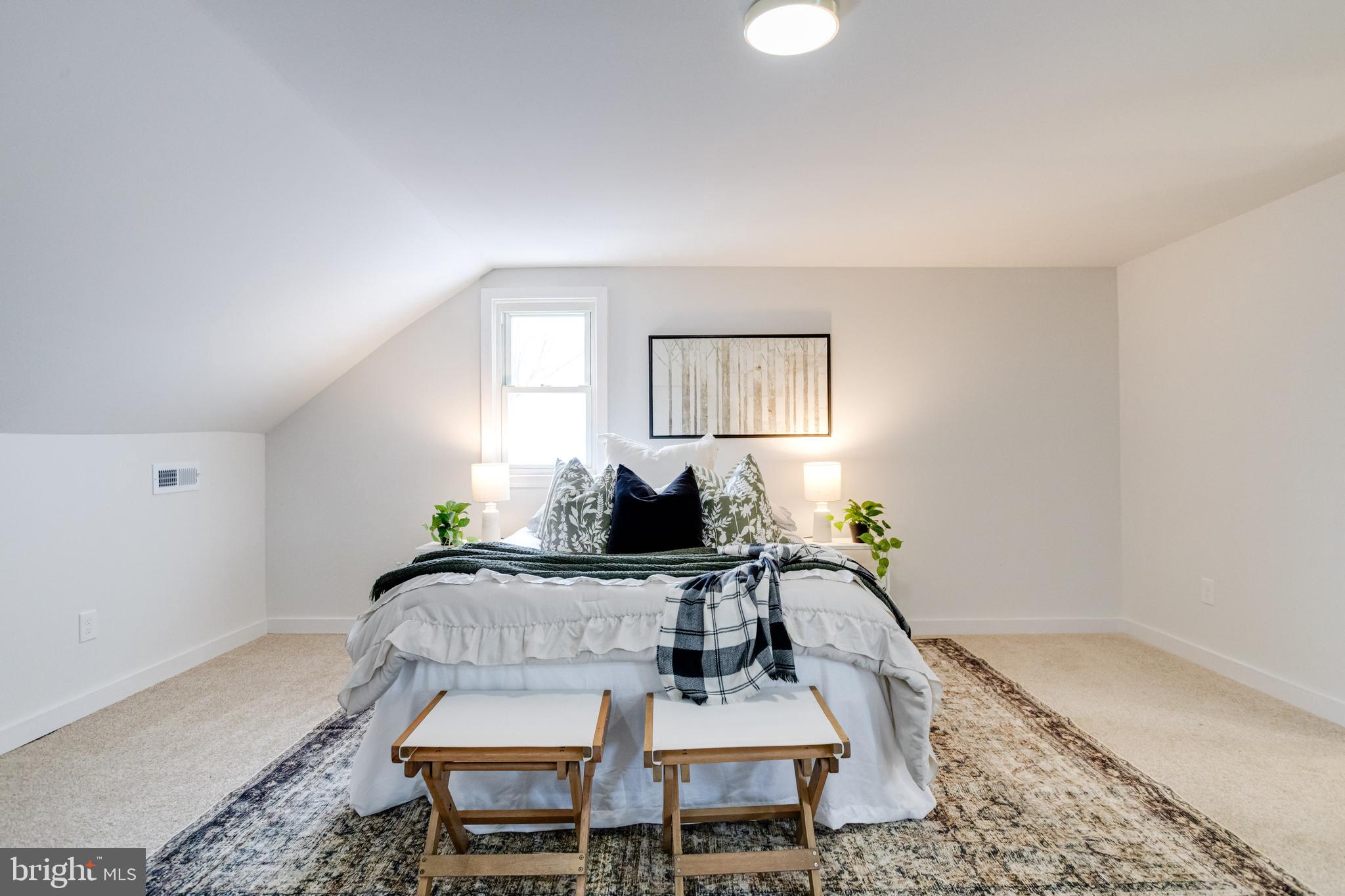 7606 Bagley Avenue Baltimore, MD 21234 - Photo 23 of 45 a living room with furniture a window and a table