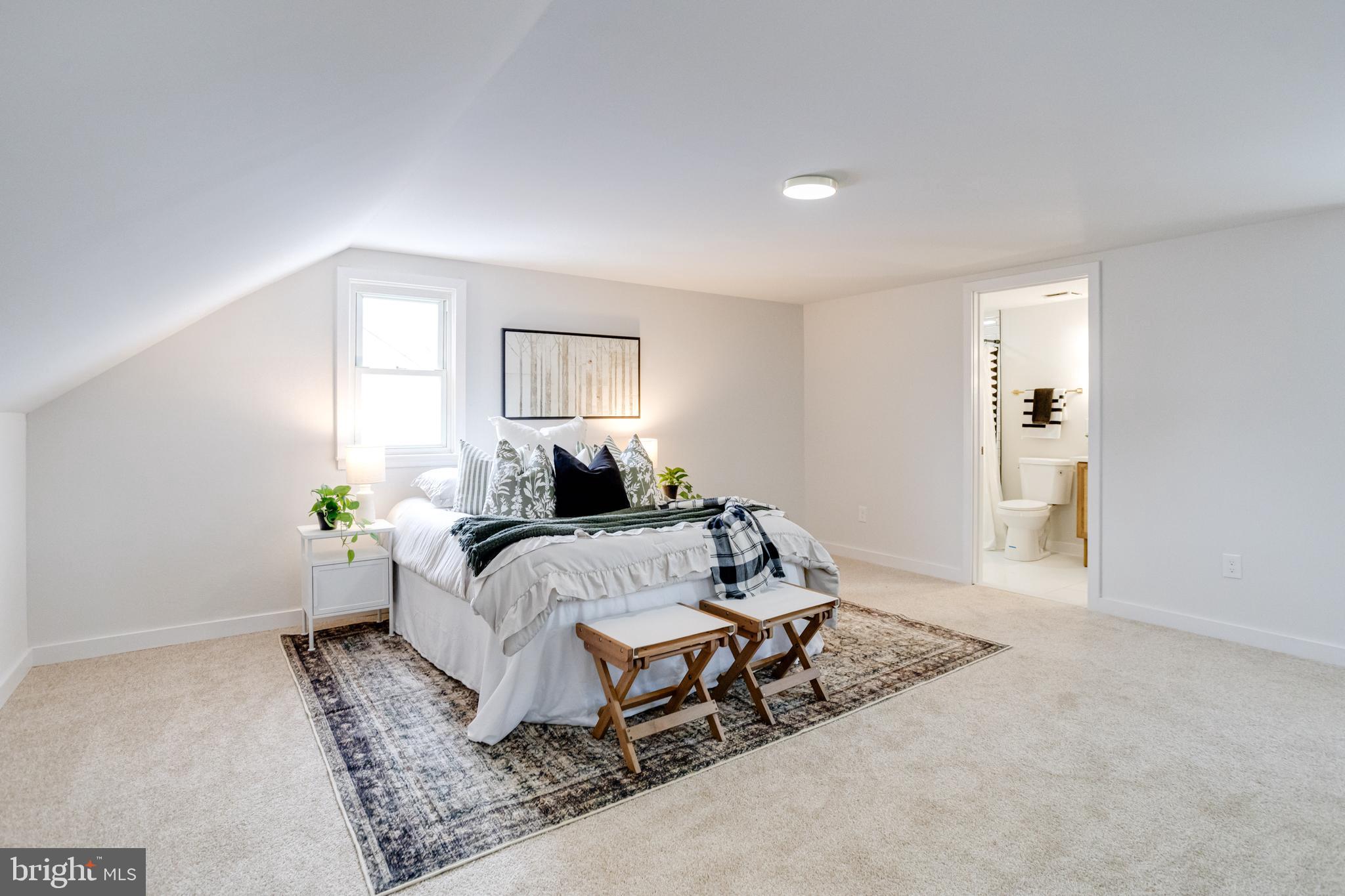 7606 Bagley Avenue Baltimore, MD 21234 - Photo 25 of 45 a bed room with a bed and a window