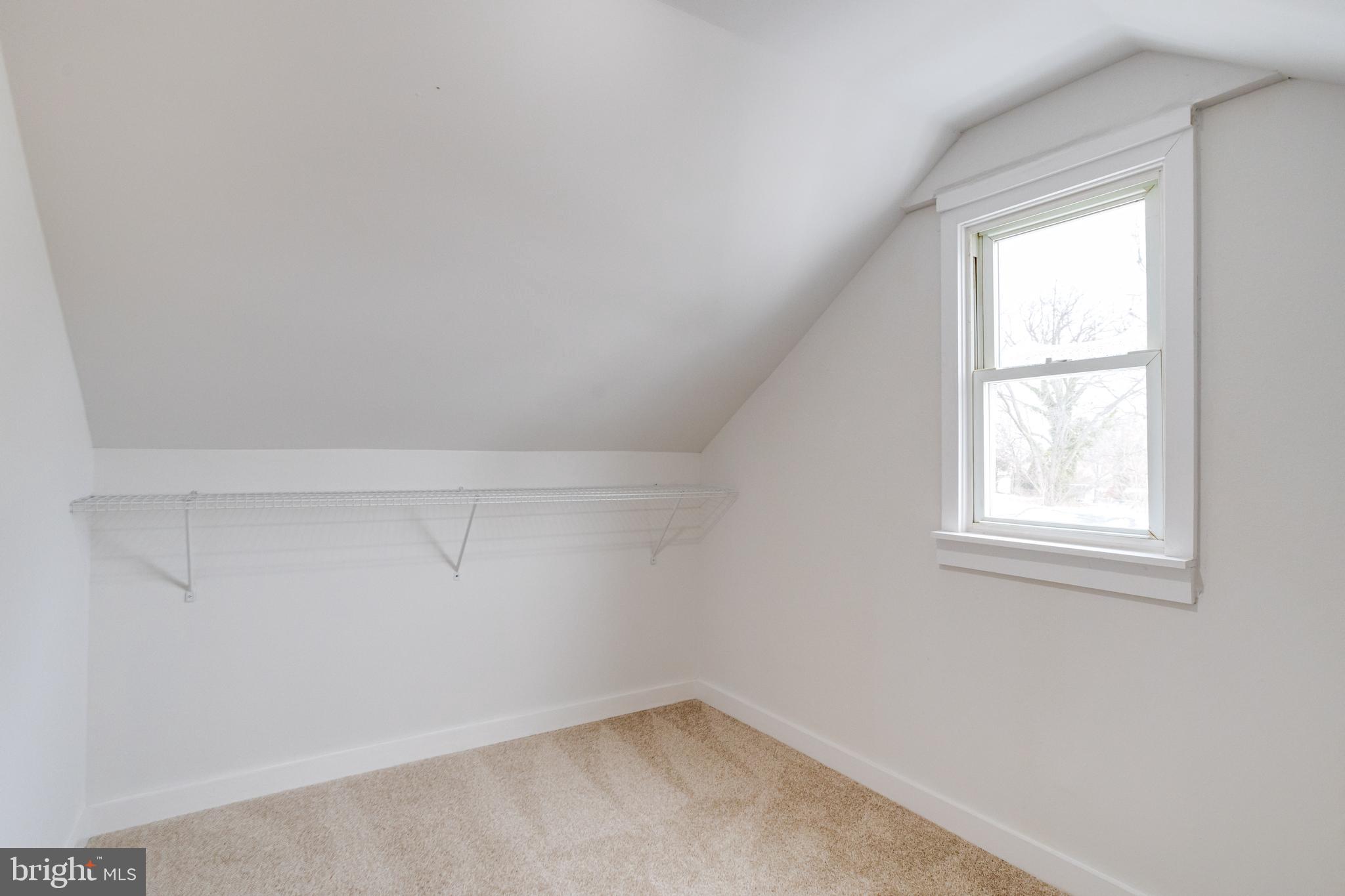 7606 Bagley Avenue Baltimore, MD 21234 - Photo 28 of 45 an empty room with a window