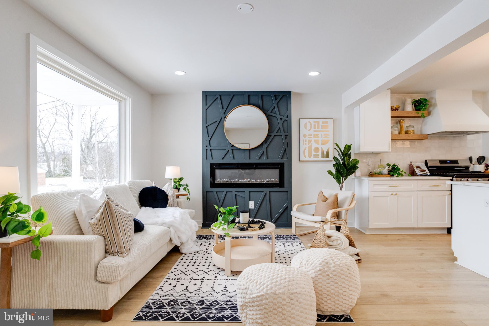 7606 Bagley Avenue Baltimore, MD 21234 - Photo 5 of 45 a living room with furniture and a large window