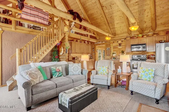 a view of a livingroom with furniture and a couch