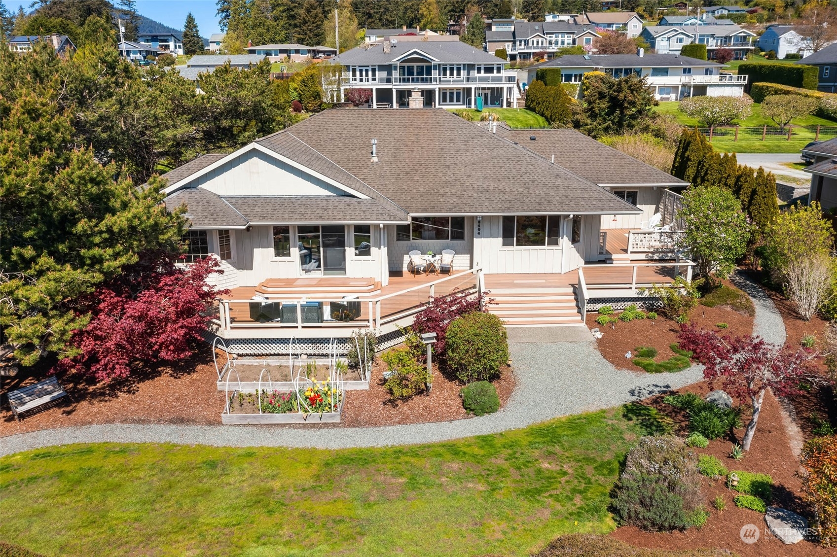 6404 Warren Street Anacortes, WA 98221 - Photo 2 of 38 a view of a house with a yard