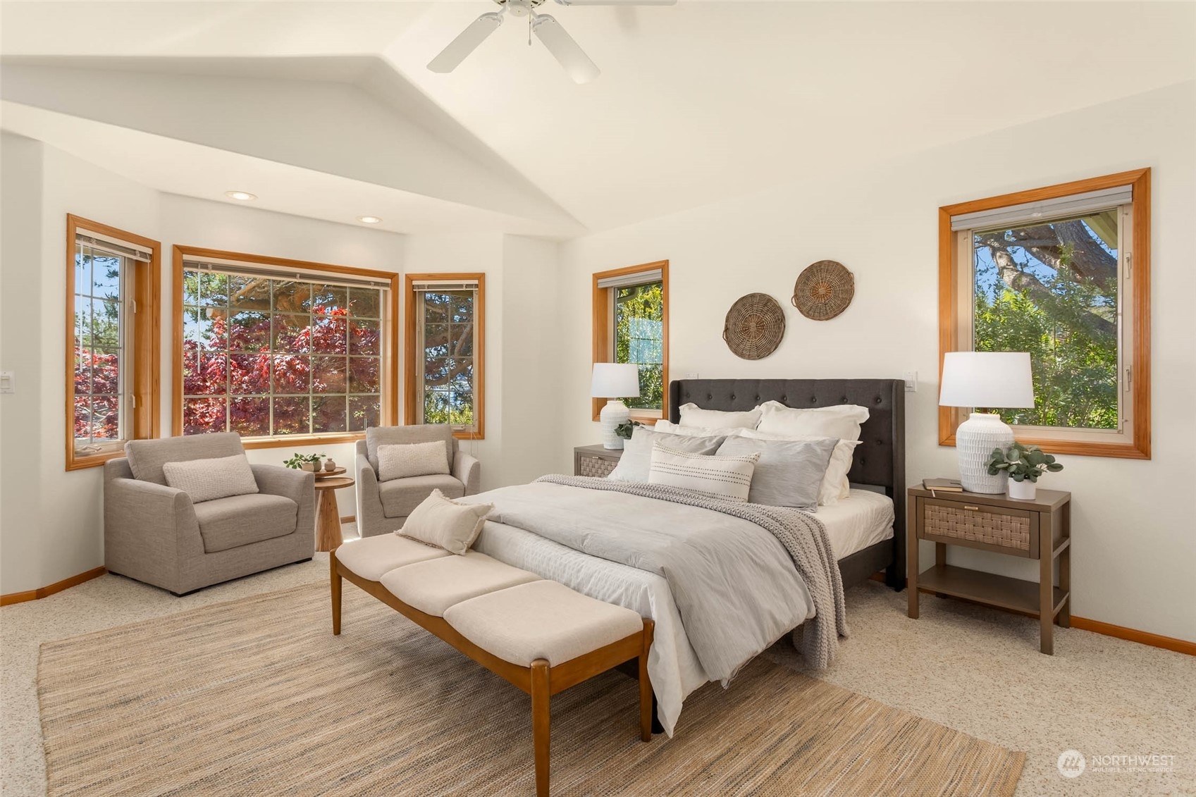 6404 Warren Street Anacortes, WA 98221 - Photo 21 of 38 a bedroom with furniture and a large window