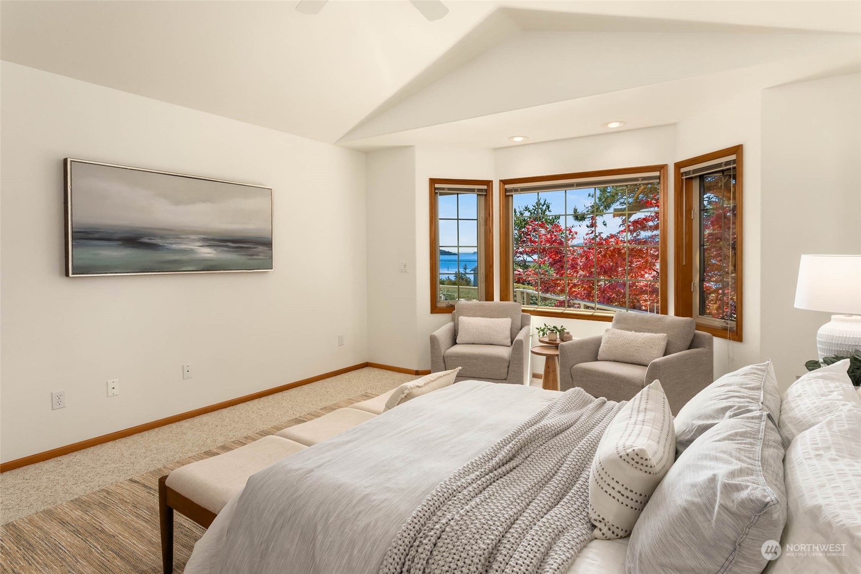 6404 Warren Street Anacortes, WA 98221 - Photo 22 of 38 a bedroom with a bed and a painting on the wall